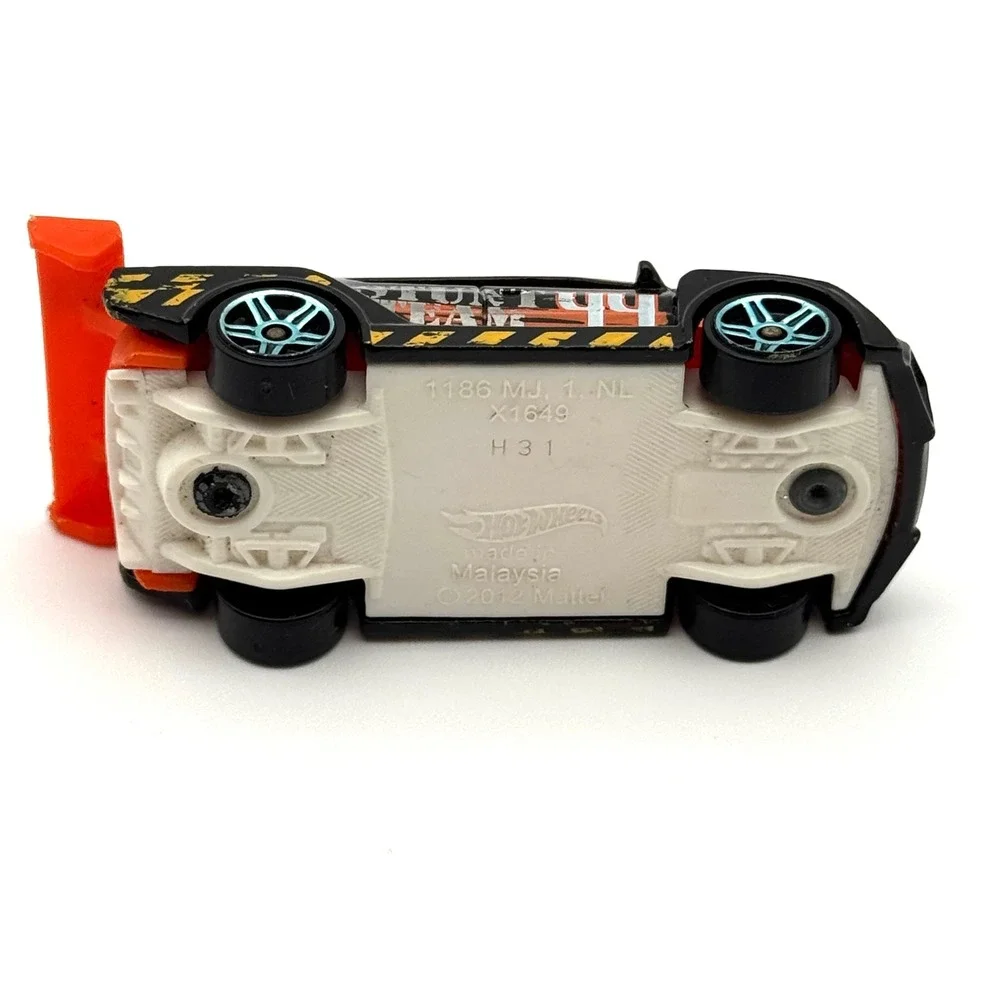 Hot Wheels Black Orange #44 Race‎ Car Stunt Team X1849 Diecast 2012